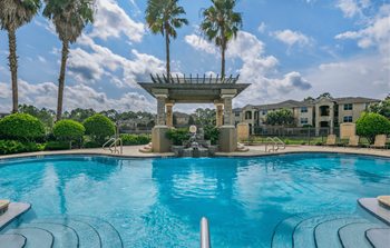 Lakeside pool with sundeck seating